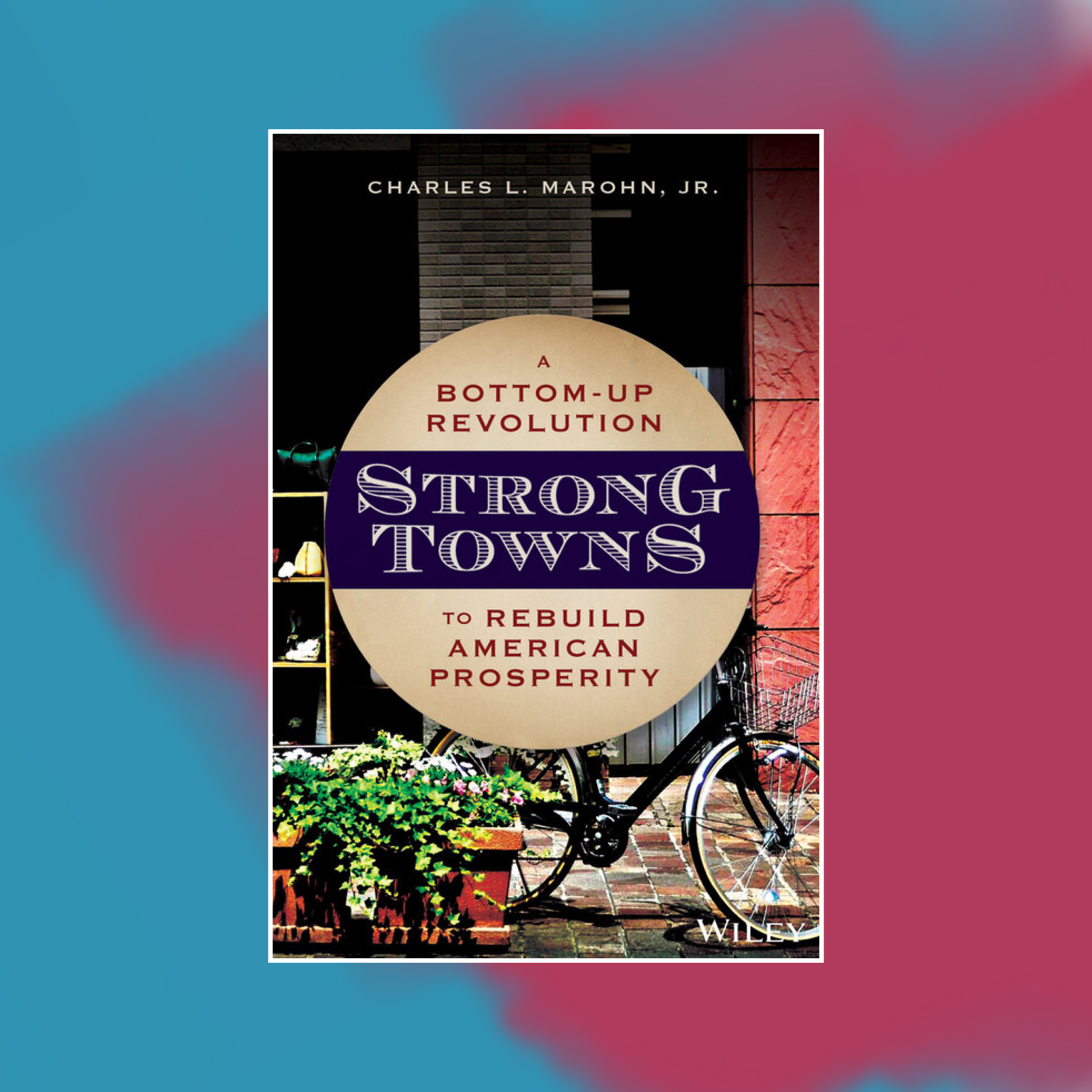 Book cover of Strong Towns against an abstract painted background