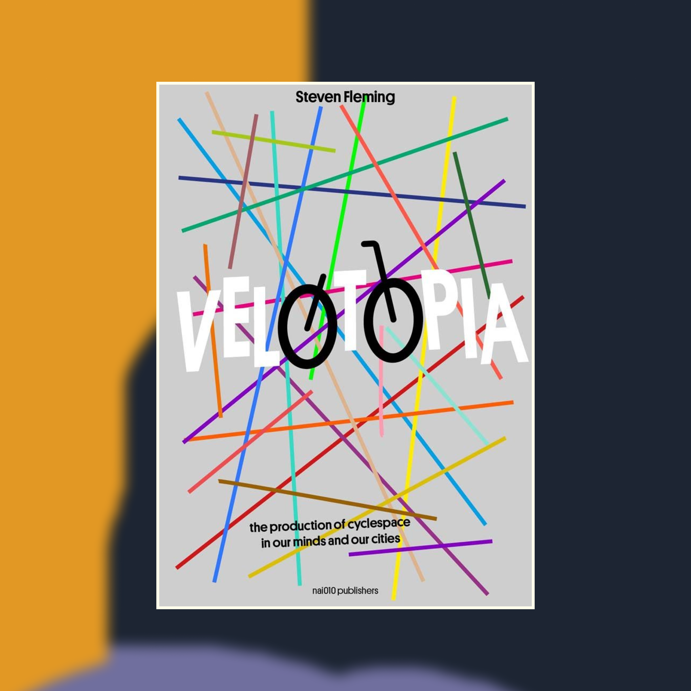 Book cover of Velotopia against an abstract painted background